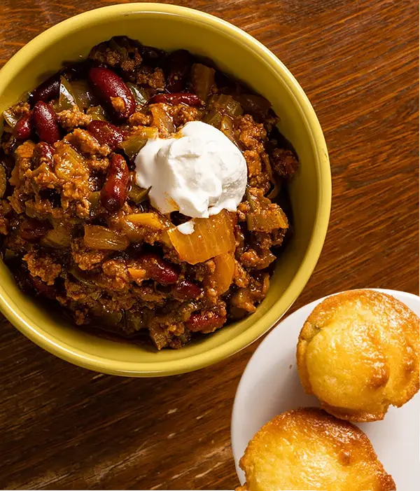 Bowl of chili with cornbread