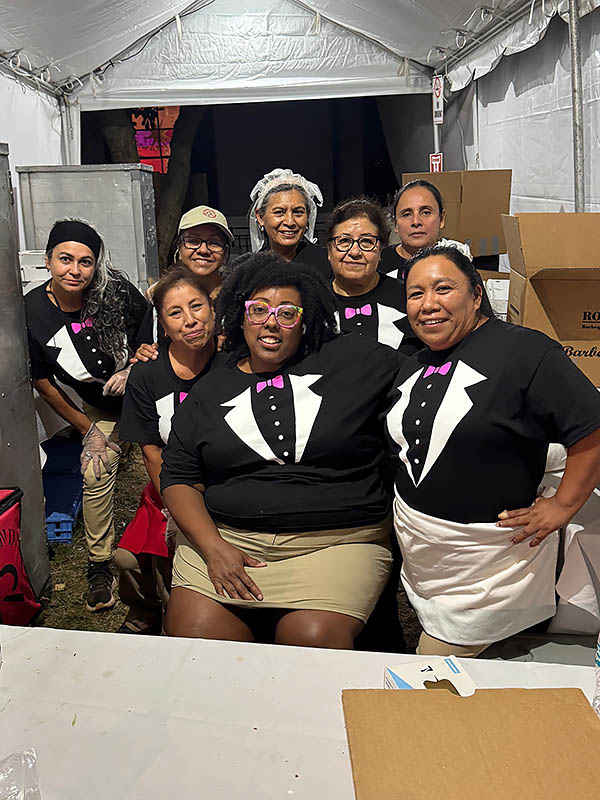 Rocklands Catering Team in the tent in their tux t-shirts