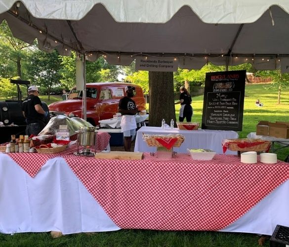Rocklands Full-Service Catering team and table setup outside