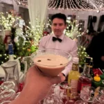 rocklands-catering-holiday-party-drink_1 Rocklands Catering bartender and guest holding drink