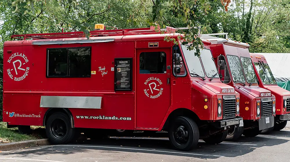 Parked fleet of Rocklands food trucks