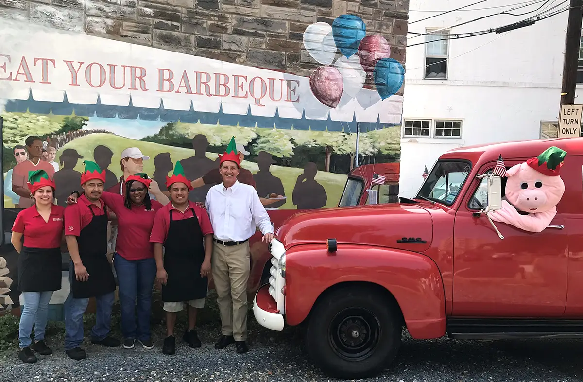 vintage photo of Rocklands crew and pig in the truck