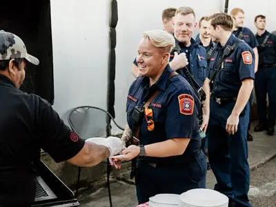 Serving barbeque to DC Firefighters