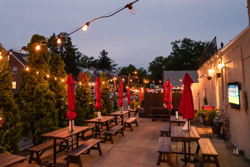 Rocklands Arlington al fresco dining patio at dusk